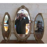 A gilt triple dressing table mirror