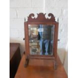 A 19th Century small shaped frame toilet mirror