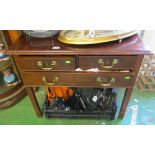 A 19th Century mahogany lowboy two short and one long drawers (some veneer a/f)