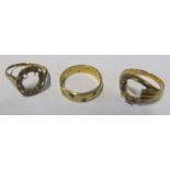A gold ring no stone, 9ct ring no stone and 9ct band 8.9 gms