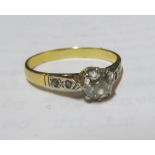 A yellow metal diamond ring marked 750 2.6gm, size M/N