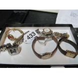 A ladies watch marked Longines, Gucci style ladies watch, Ebel ladies watch marked steel and 18k