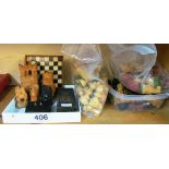 Five treen Chess pieces, soapstone model, mixed and part Chess sets, travel Chess board and
