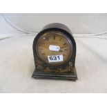 A Mappin & Webb black lacquer clock (case cracked)