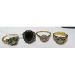 A 9ct gold illusion set cluster ring, 9ct green stone ring and two other rings