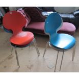 Six coloured stacking chairs