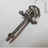 An old cut diamond brooch in the form of a sword