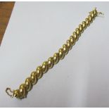 A gold coloured bracelet