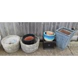 A pair of garden pots and five other pots