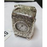 A Victorian silver case miniature travelling clock