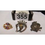 A Royal Air Force Music Services brooch marked silver, silver Luckenbooth brooch and an opal brooch,