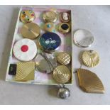 Two Estee Lauder solid perfume compacts and other compacts