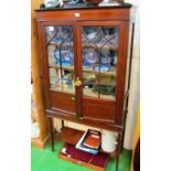 An Edwardian mahogany and satinwood banded display cabinet