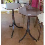 A pair of 19th Century octagonal topped wine tables on tripod supports (one top split)