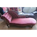 A Victorian walnut showframe chaise longue