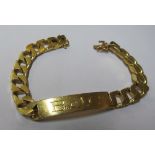 A gold identity bracelet 67.3gm