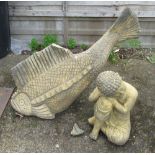 A stoneware garden fish ornament (a/f) and a Thai figure