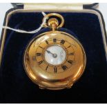 An 18ct half-Hunter pocketwatch inscribed Jays, Oxford St. white dial with second dial, engraved