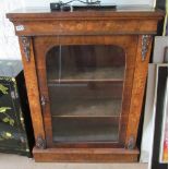 A Victorian walnut pier cabinet inlaid ribbons and flowers, single glazed door and gilt floral