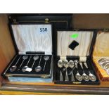 A set of six tablespoons marked M F N 90 and various boxed plated cutlery