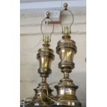 A pair of large brass table lamps
