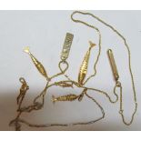 A gold coloured chain, 9ct 'Jon' label, gold coloured pencil and chain with fish