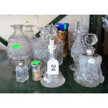 A glass tea canister, four glass decanters (no stoppers), scent bottle et cetera (some a/f)