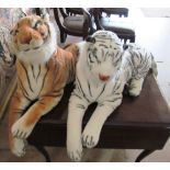 Two large toy tigers