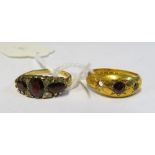 A 9ct gold garnet and diamond ring 2.7gm, size P/Q and a 22ct garnet gypsy ring (one stone