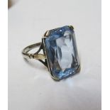 A 9ct white gold ring set blue stone