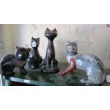 Four cat ornaments