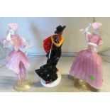 A pair of Venetian pink glass figures gallant and lady and a pottery figure Spanish dancer