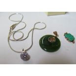 A jade style pendant, green pendant and ball on chain