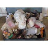 A suitcase full of soft toys