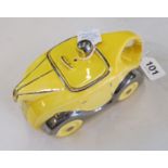 A Jones Sadler OKT42 teapot as yellow car (some crazing), impressed 'Made in England'