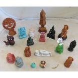 A collection of models and wood Asian religious figures