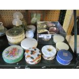 Various compacts, powder boxes, two perfume bottles and a print lady