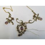 An Edwardian 9ct gold amethyst and seed pearl necklace and chain in need of repair 10.1gm