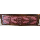 A Victorian walnut fret work panel with silk backing