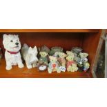 Various bear ornaments and two dogs