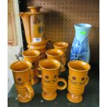 A Carlton Ware coffee pot and six mugs sunflower design and a Crown Ducal 'Charlotte Rhead' vase