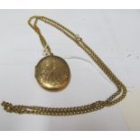 A 9ct gold locket on chain 17.4g (32.2g total)