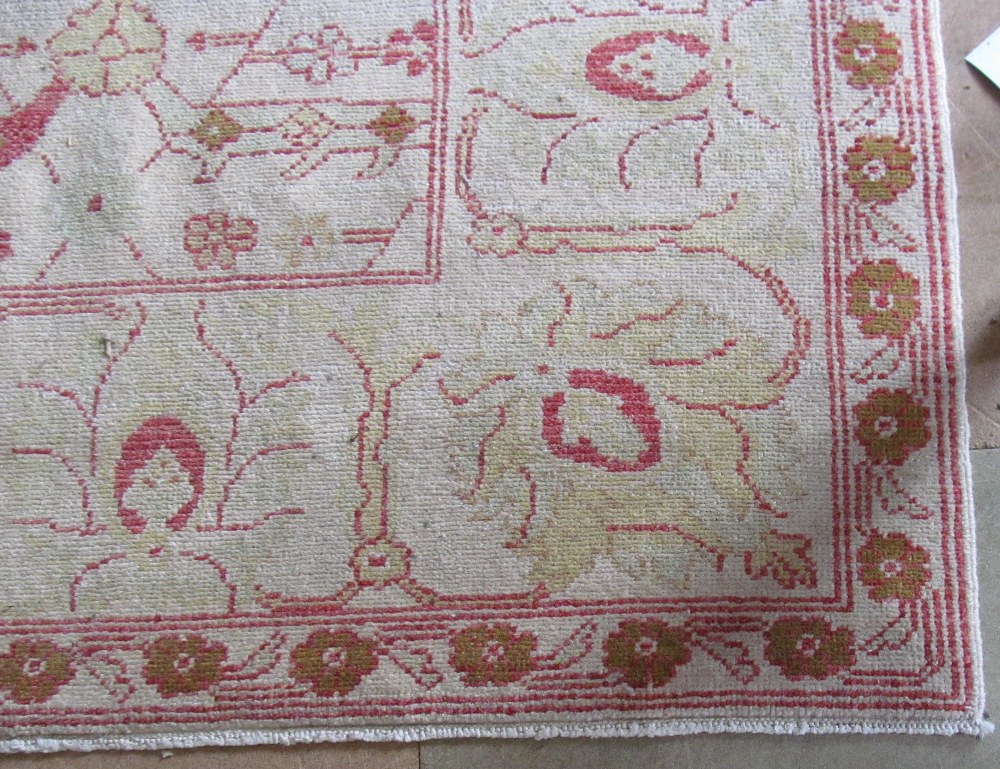 A Chinese beige ground wool carpet with design of red, yellow and beige flowers 9' x 12' - Image 2 of 4