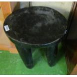An African ebonised stool