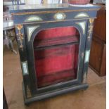 A Victorian ebonized pier cabinet with floral porcelain panels (no glass to door)