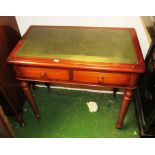 An Edwardian mahogany leather top two drawer table