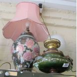 A pink and green table lamp, brass oil lamp and a Victorian oil lamp