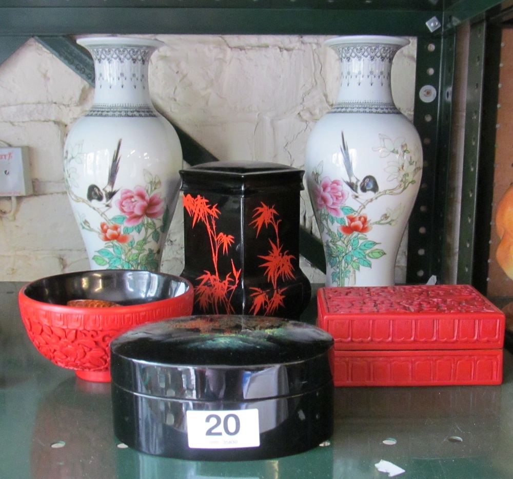 A pair of Oriental vases decorated magpies and some Oriental lacquer boxes