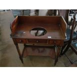 A mahogany washstand with recess for bowl gallery back