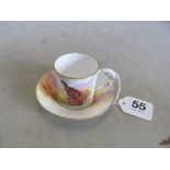 A Royal Worcester cup and saucer pheasant design